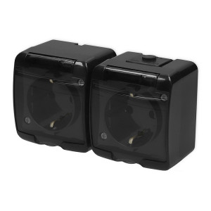 JUNIOR Gniazdo podwójne SCHUKO natynkowe hermetyczne IP54 16A 250V, czarne klapka dymna; 12GHE-2SD KARLIK