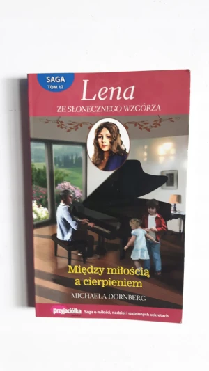 MIĘDZY MIŁOŚCIĄ A CIERPIENIEM - Michaela Dornberg - książka