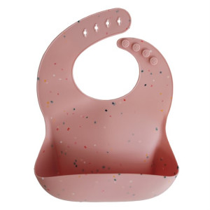 Mushie - śliniak silikonowy z kieszonką Powder Pink Confetti