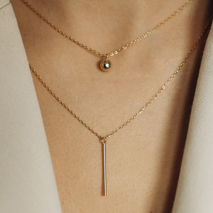 Naszyjnik pozłacany dwuwarstwowy z zawieszkami