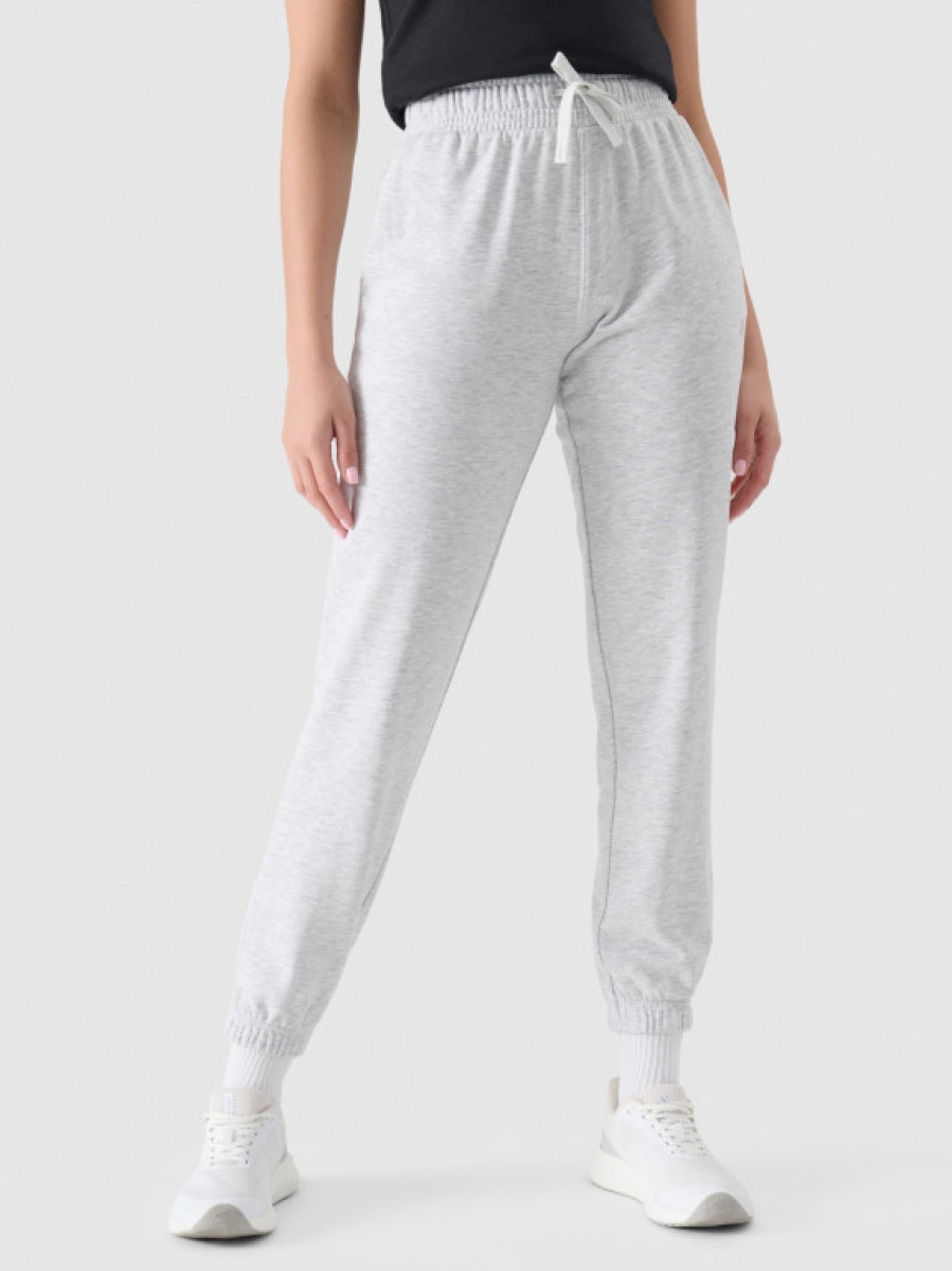 Damskie spodnie dresowe joggery 4F 4FWMM00TTROF1138 - szare
