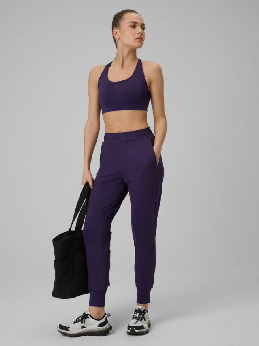 Damskie spodnie treningowe 4F 4FWSS26TFTRF1074 - fioletowe