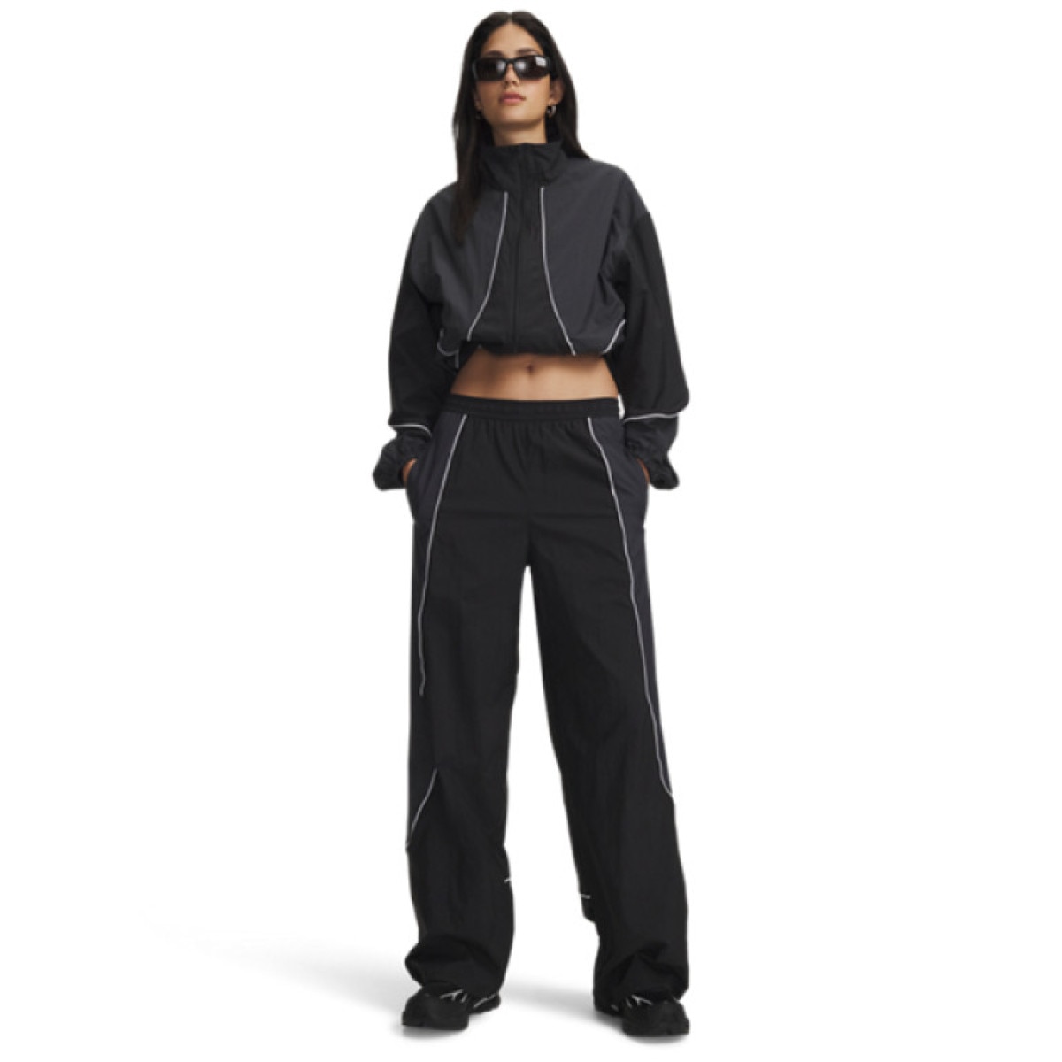 Damskie spodnie sportowe Under Armour Unstoppable Wvn Wind Pnt - czarne