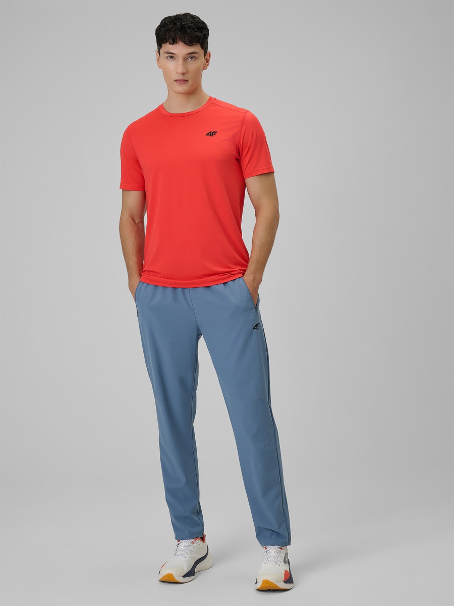 Męskie spodnie treningowe 4F 4FWSS26TFTRM1047 - denim