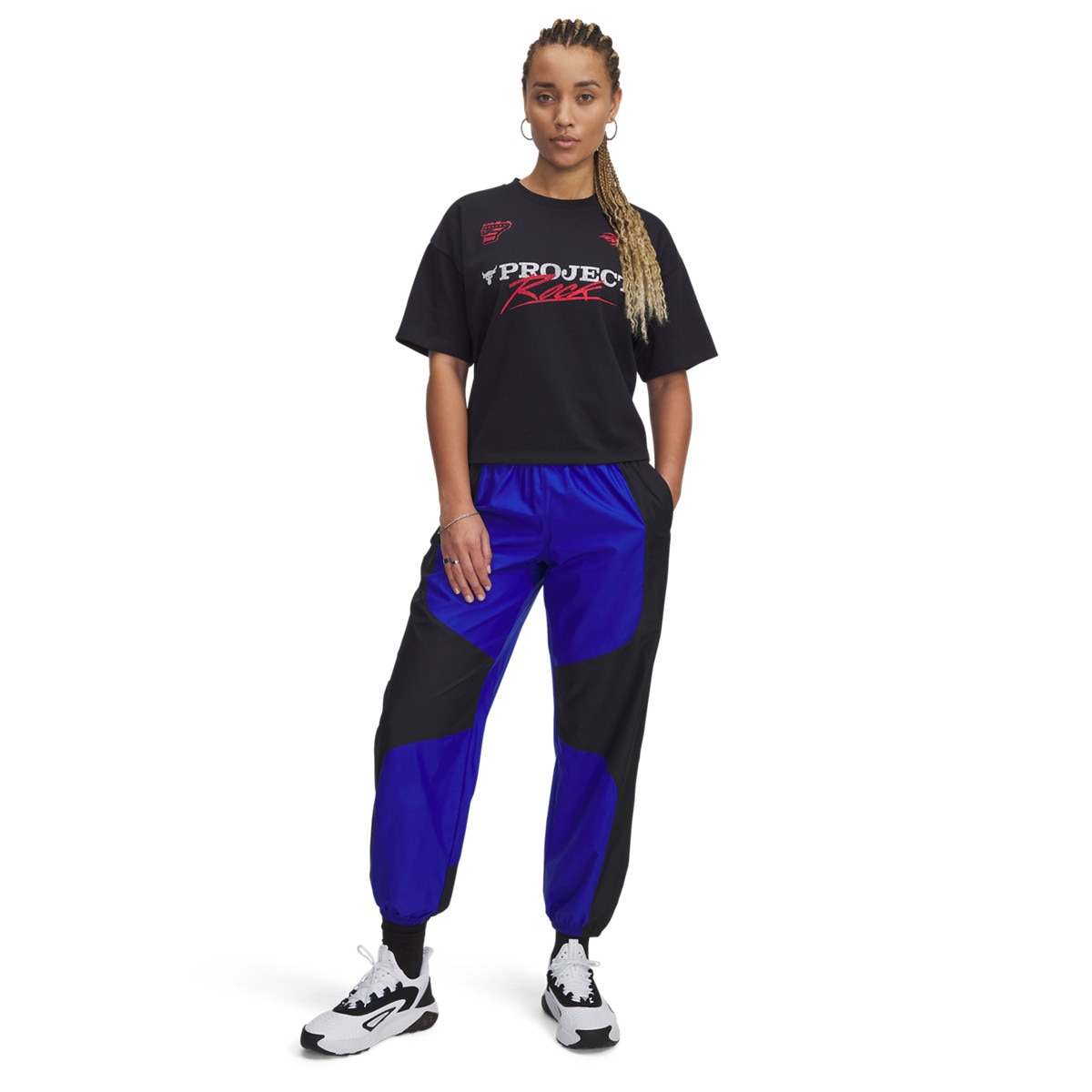 Damskie spodnie treningowe Under Armour Project Rock Woven Bottom - niebieskie