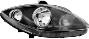 Reflektor lampa lewa z silnikiem elektrycznym SEAT LEON 2 TYC