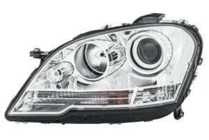 Reflektor lampa lewa z silniczkiem do regulacji MERCEDES-BENZ KLASA M W164 HELLA