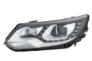 Reflektor lampa lewa bi-ksenon z silniczkiem do regulacji z żarówką VW TIGUAN 1 HELLA