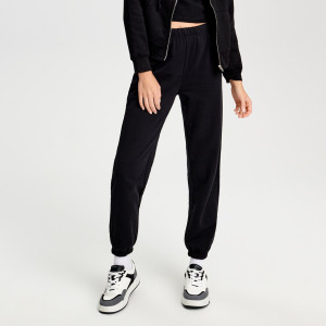 Sinsay - Spodnie dresowe - Czarny - damski - 1429O-99X