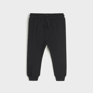 Sinsay - Spodnie dresowe jogger - Czarny - chłopiec - 5441Z-99X