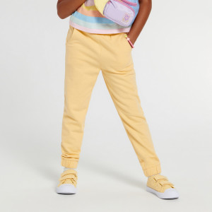 Sinsay - Spodnie dresowe jogger - Żółty - dziewczynka - 5713R-10X