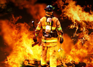 Fototapeta Straż In to the fire, a Firefighter searches for possible survivors