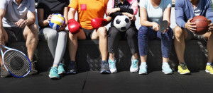 Fototapeta Sport Group of diverse athletes sitting together