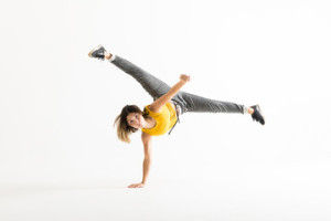 Fototapeta Breakdance Attractive Young Woman Doing A Freeze Breakdance Move