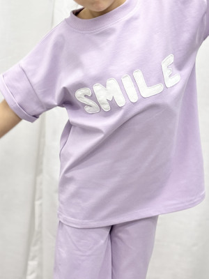 T-shirt bawełniany z napisem „Smile” w kolorze lila dla dzieci