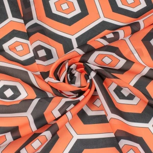 Tkanina szyfon wzór geometryczny czarny i pomarańczowy TextileClub 