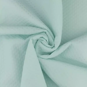 Tkanina żakard wzór geometryczny kolor pastelowa pistacja