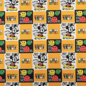 Dzianina dresówka wzór Myszka Miki kolor ciemny żółty