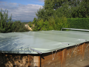 NeoCover bâche à barres piscine bois Coverwood sur mesure