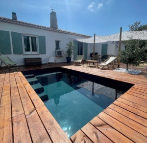 Piscine coque de 10 m2 : Serre chevalier de couleur noir Sans filtration