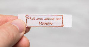 Label à coudre Cottonera Classic – tissé, écru & marron, set de 25