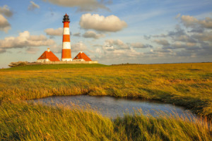 Wunschbild Posterdruck - Leuchtturm Westerheversand Bei Sonnenunter...