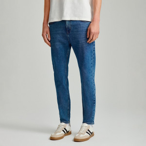 Granatowe jeansy carrot fit - House - niebieski - 069BT-55J
