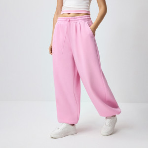 Różowe spodnie dresowe basic o kroju jogger - House - pastelowy różowy - 385KS-03X