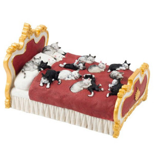 L'Homme Moderne Des chats sur un lit Dubout