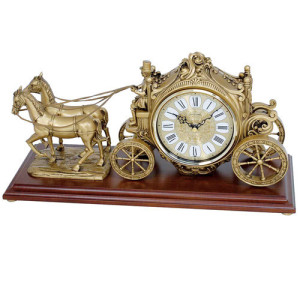 L'Homme Moderne La pendule carrosse doré