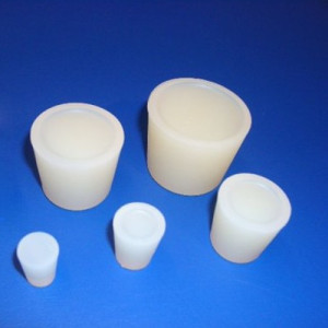 Stopfen aus Silikon für die Food- und Pharmatechnik  unten: 31 mm /  oben: 38 mm / Höhe: 35 mm / Bohrungen: 2 /  a: 7 mm / Einheit: 25 Stück