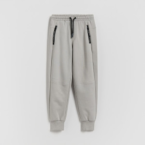 Sportowe spodnie jogger - 128 (7-8 lat) - jasnoszary - chłopcy - Reserved - 403HK-09X