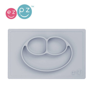 EZPZ Silikonowy talerzyk z podkładką 2w1 Happy Mat pastelowa szarość- sklep z zabawkami online