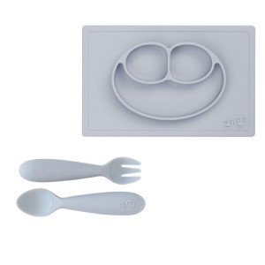 EZPZ Silikonowy talerzyk z podkładką 2w1 Happy Mat + GRATIS komplet silikonowych sztućców pastelowa szarość- sklep z zabawkami online